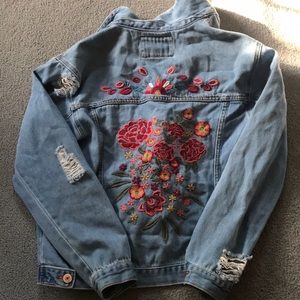 Distressed and embroidered denim jacket